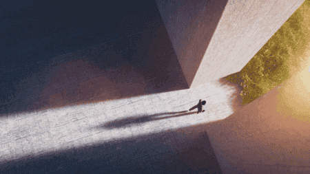 Business person walks from a grey office into a green field
