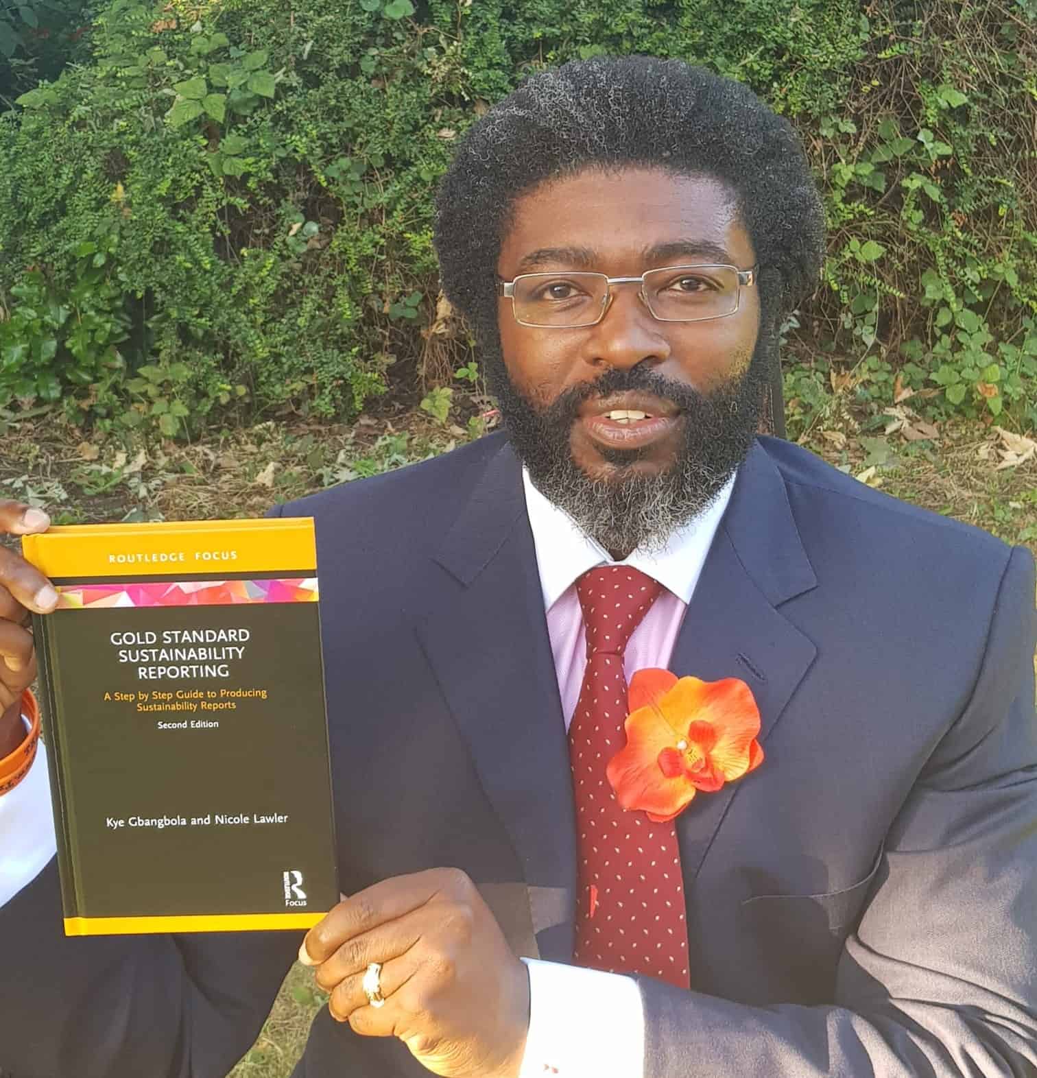 Image of Kye Gbangbola with his book