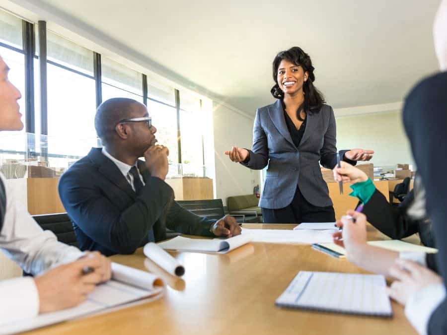 Woman CEO leading a meeting