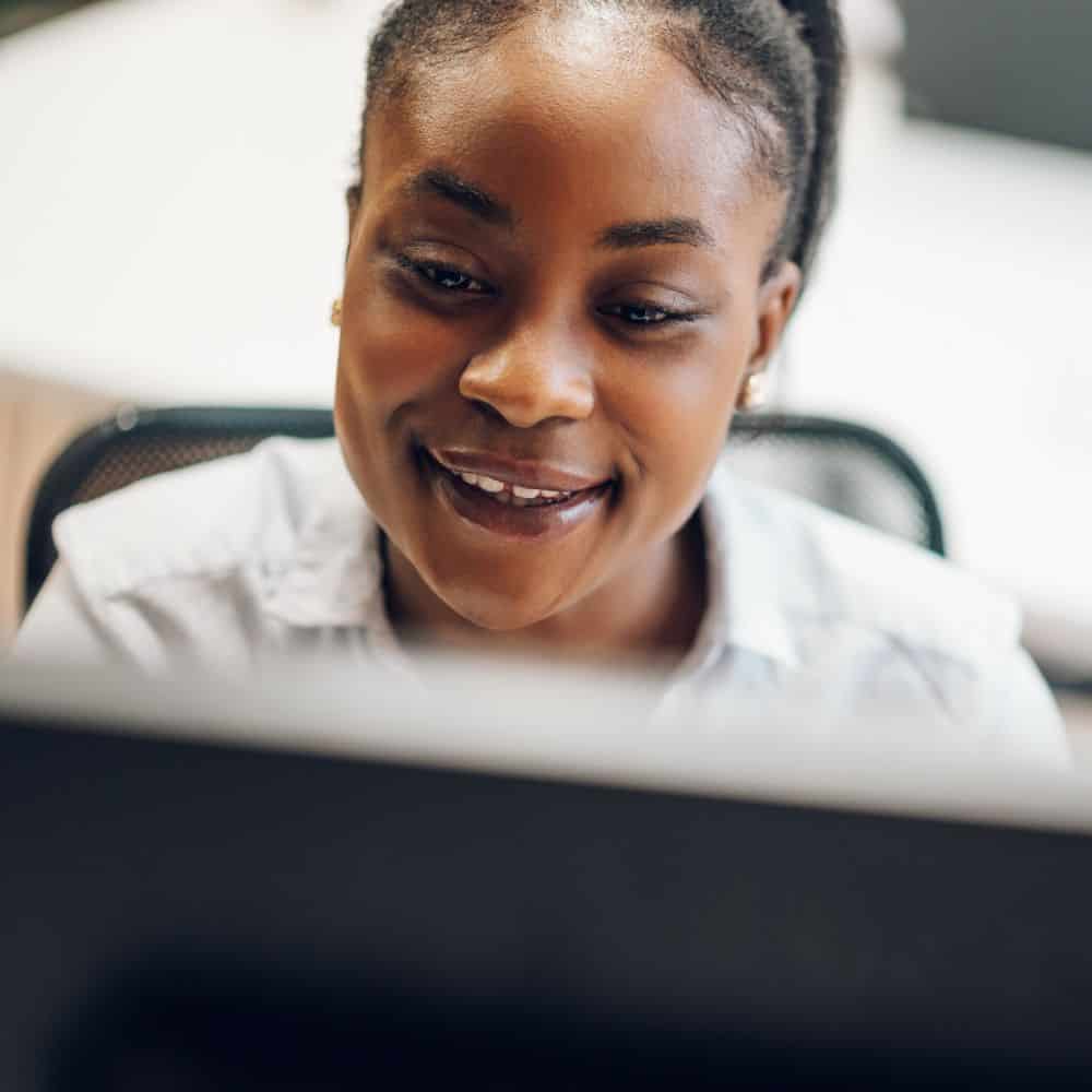 Woman working at a laptop