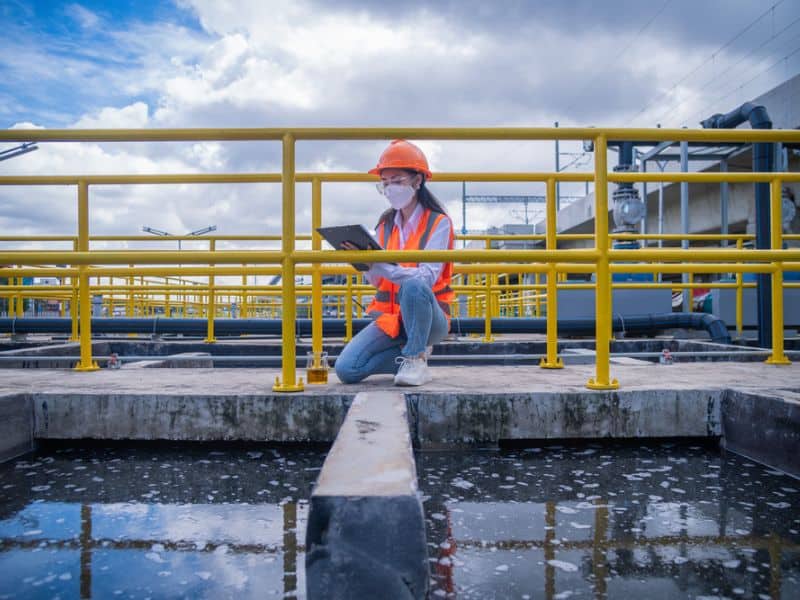 Hydrologist consulting in a water treatment plant