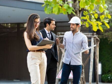 Three people working together