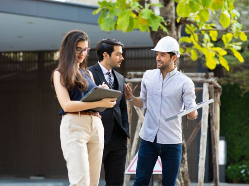 Three people working together