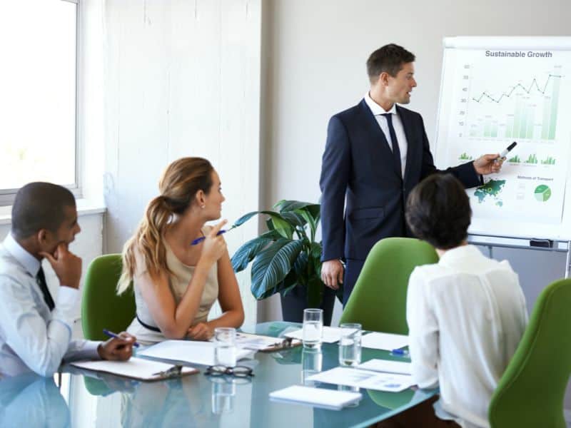 Sustainable finance advisor giving a presentation