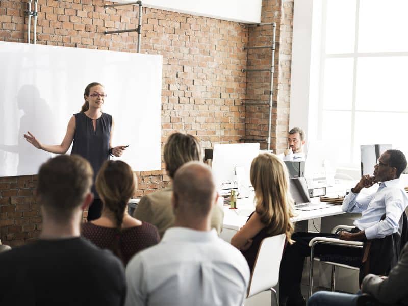 Image of classroom learning with a whiteboard