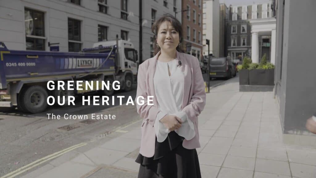 The Crown Estate video thumbnail. A photo of a woman on a street outside some buildings in London