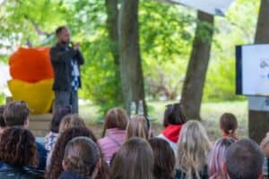 Children learning in an outdoor classroom setting