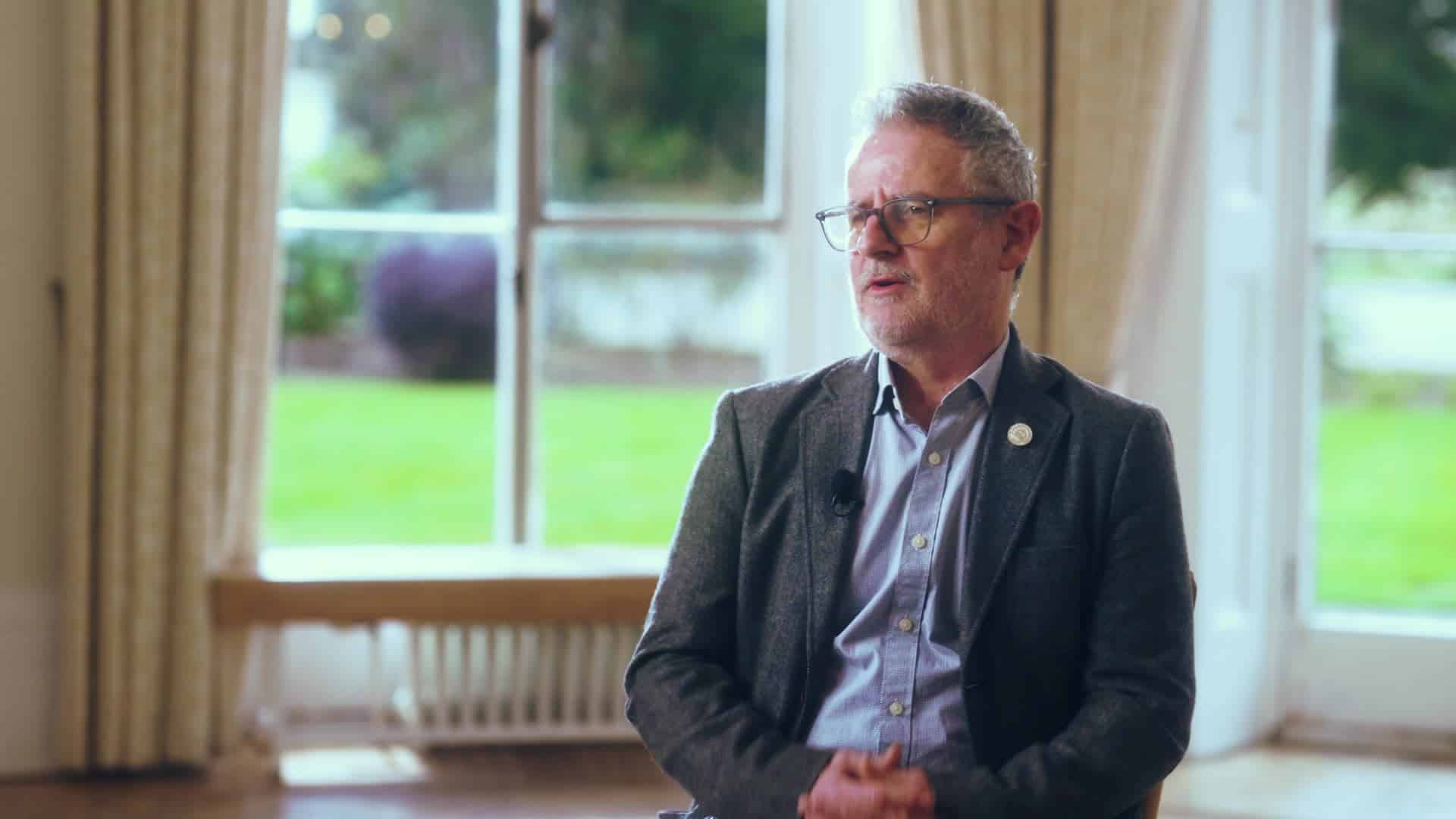 Photo of Phil speaking to camera