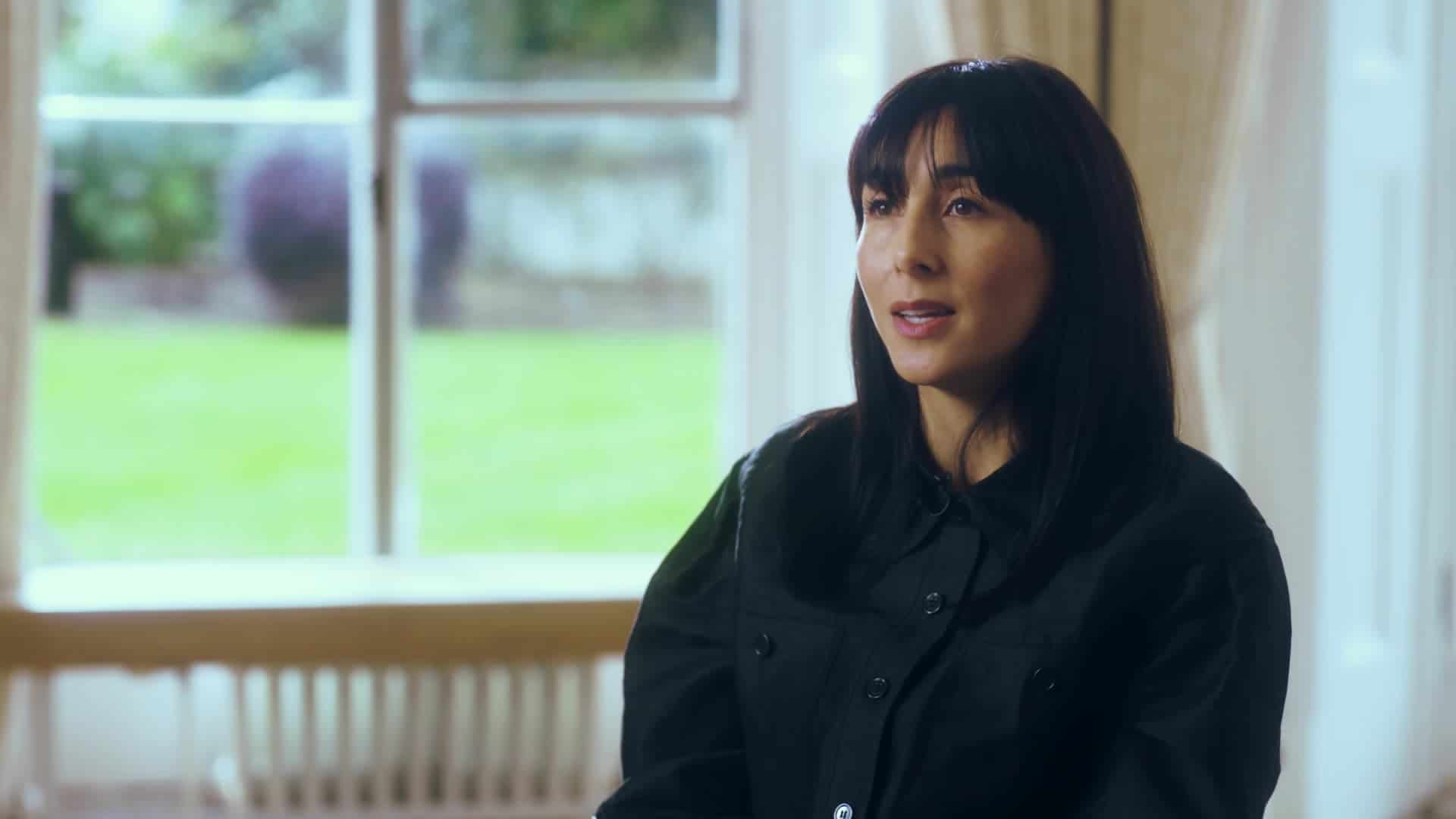 Photo of Pamela talking to the camera