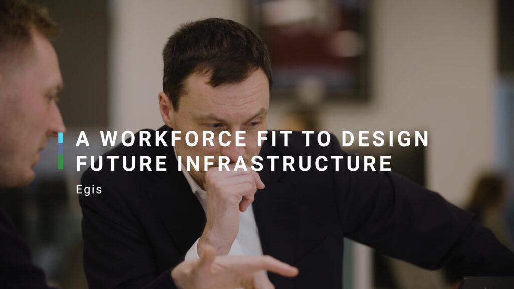 still image of a man in a meeting. title across screen - a workforce fit to design future infrastructure