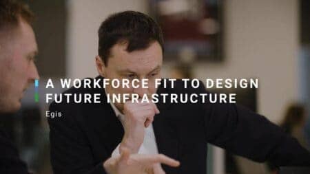 still image of a man in a meeting. title across screen - a workforce fit to design future infrastructure