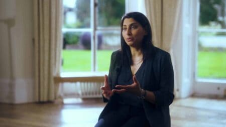 Photo of Dhara speaking to camera