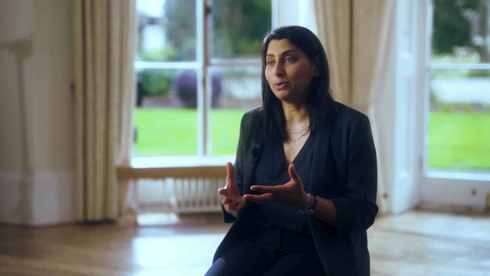 Photo of Dhara speaking to camera