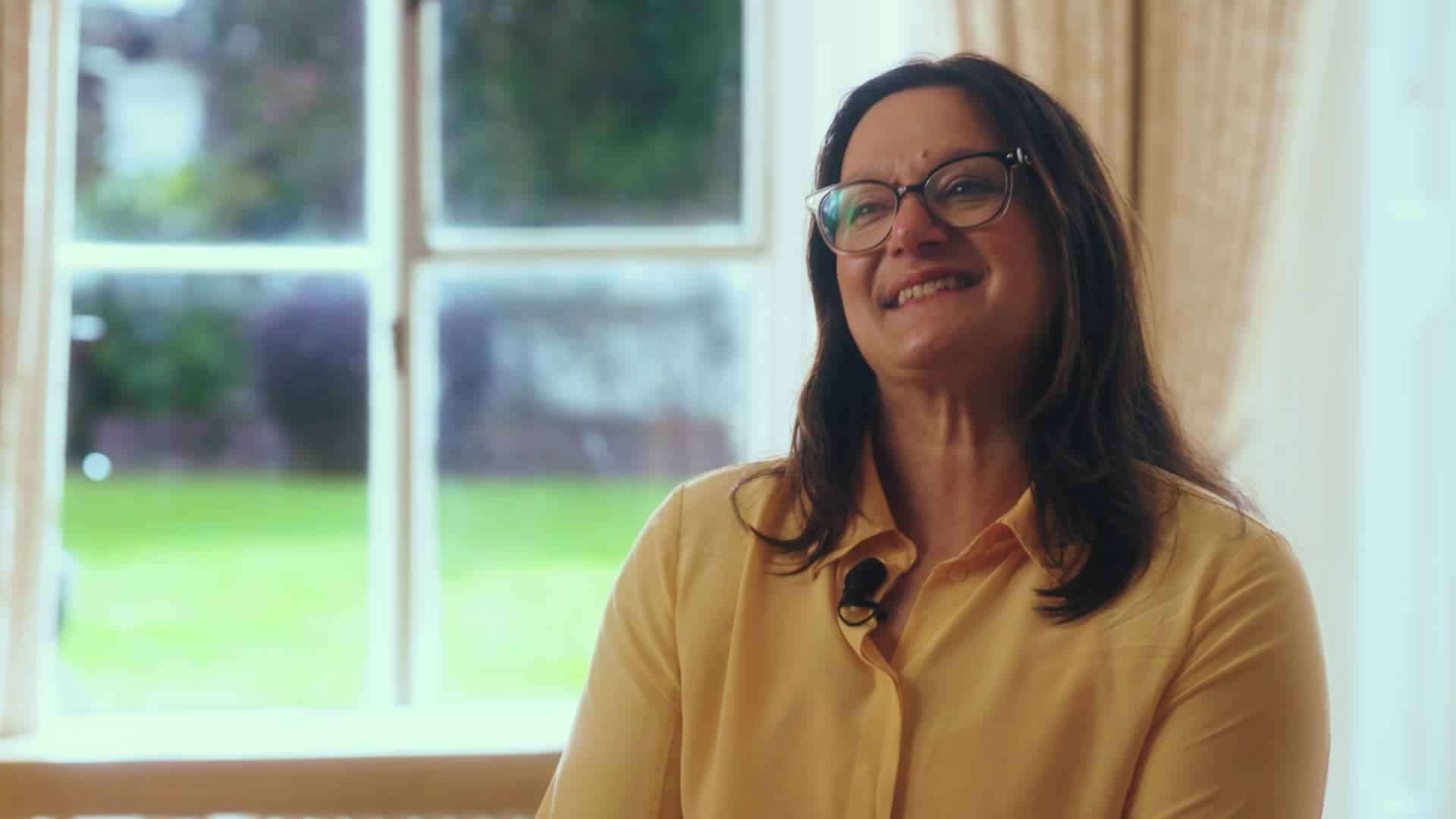 Photo of Sarah talking to camera