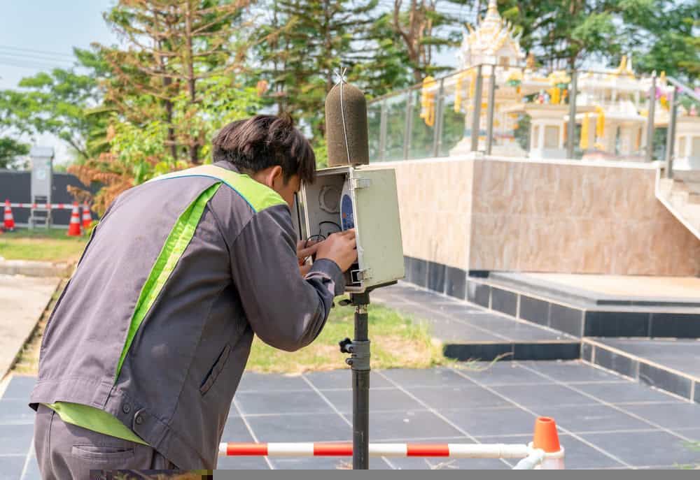 A picture of a man taking an environmental sample